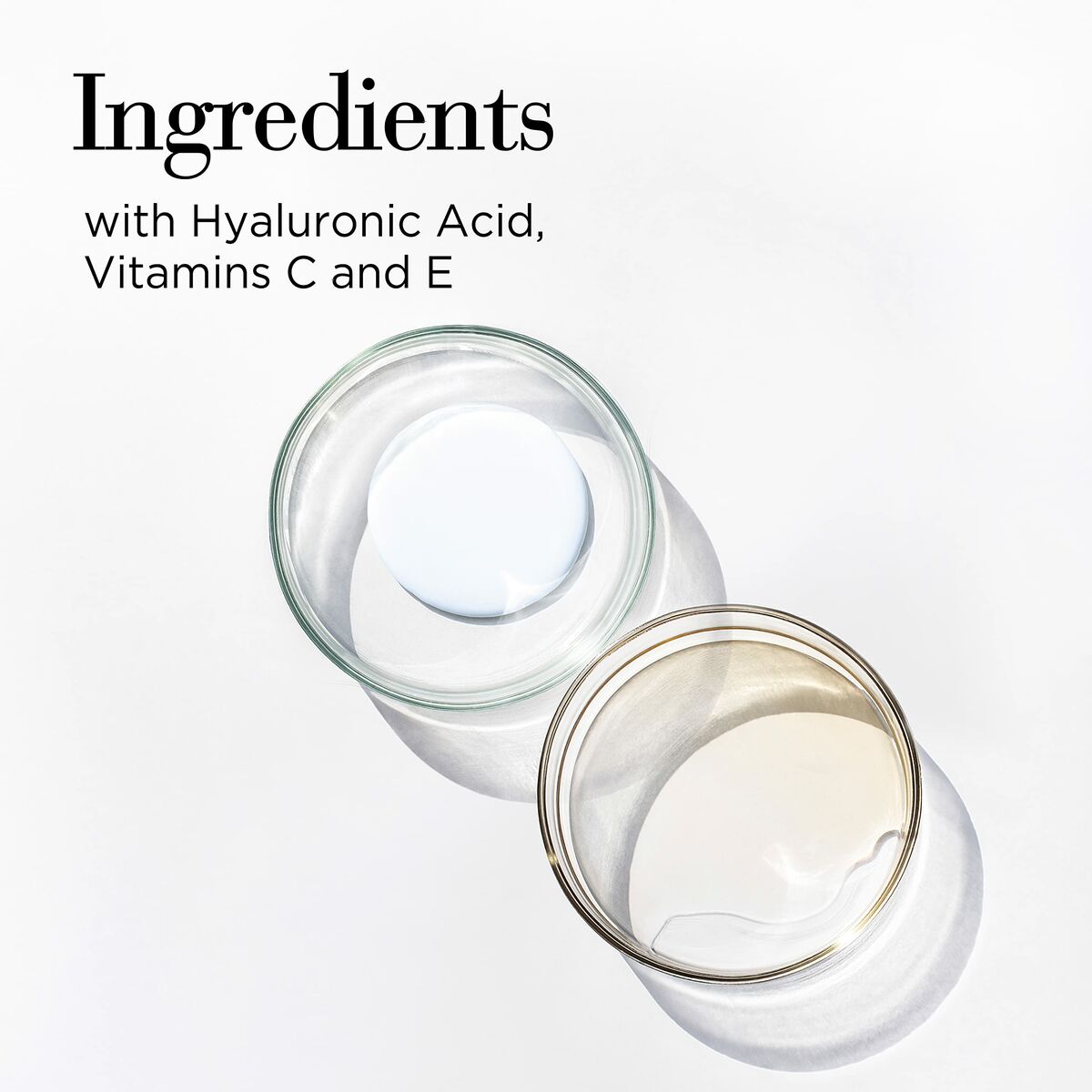 Ingredients including Hyaluronic Acid, Vitamins C and E in two clear jars on a white background.