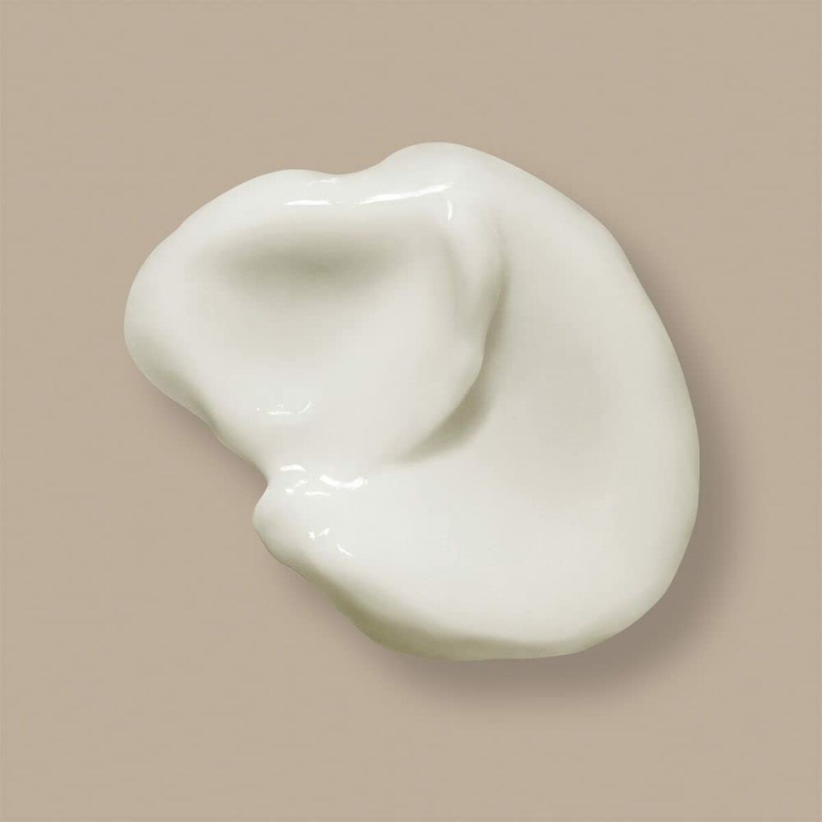 Texture of bareMinerals Skinlongevity cream, a luxurious vegan face cream for women.