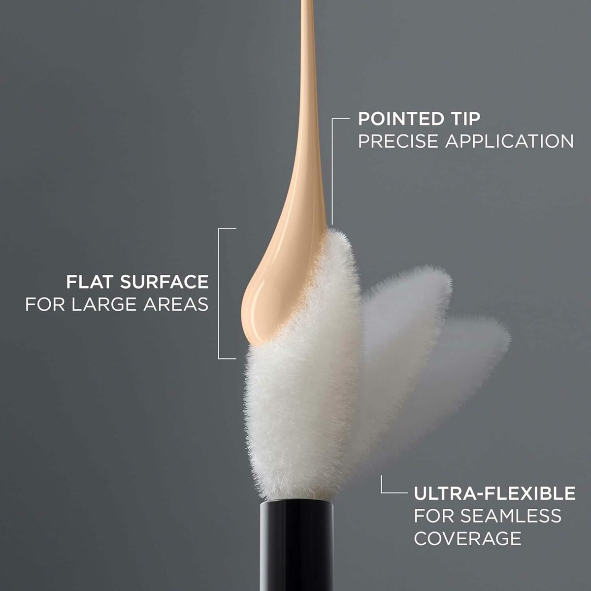 Close-up of a foundation applicator showing pointed tip and flat surface for precise and seamless makeup application.