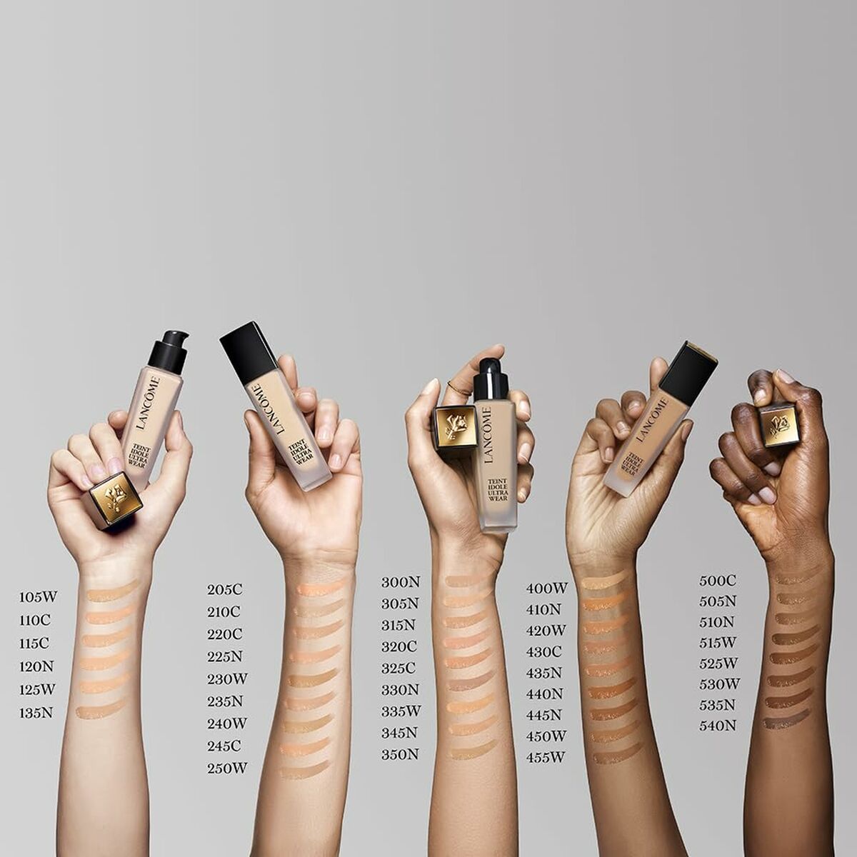 Variety of Lancôme Teint Idole foundations displayed with swatches on different skin tones.